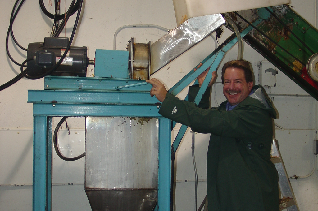 Bill Jacobson making apple cider